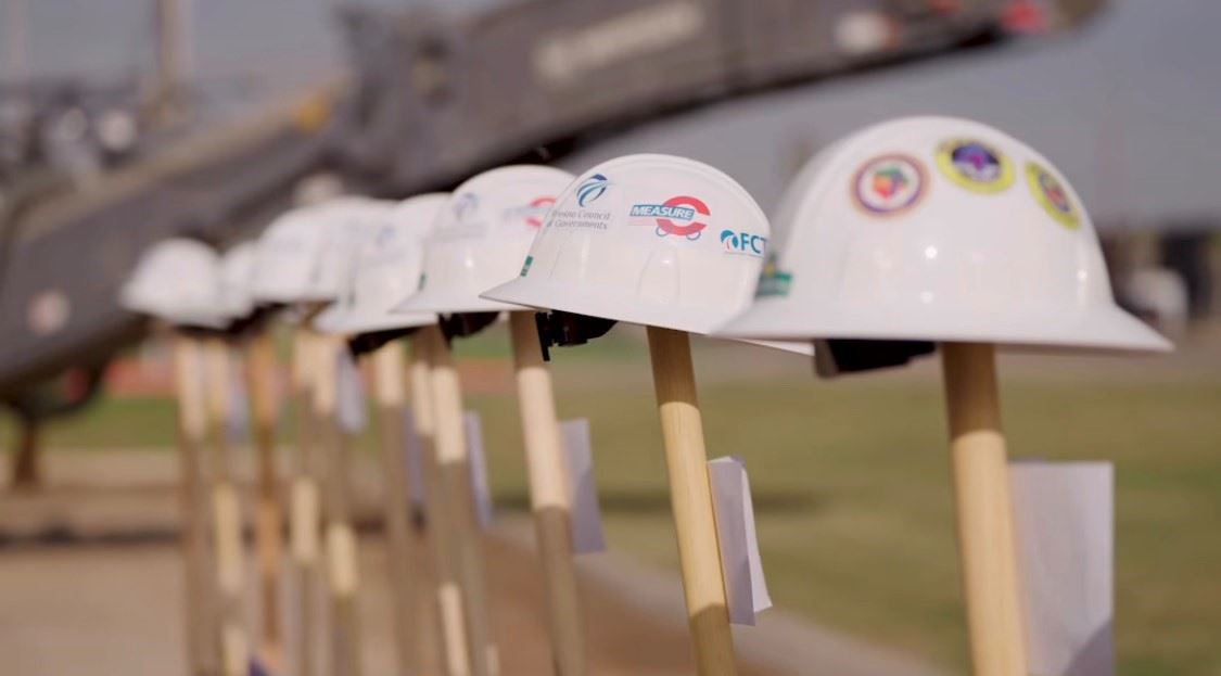 Golden State Blvd Groundbreaking Ceremony image with construction hard hats